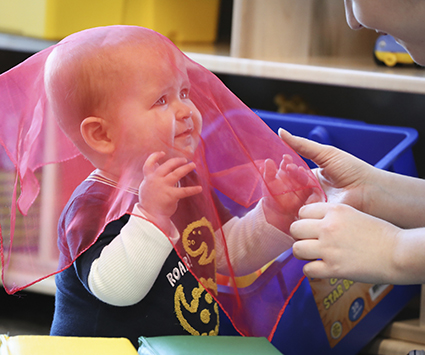 Early Childhood Education Matters. The Science Says It Does - Child with scarf