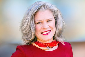 A headshot of a woman