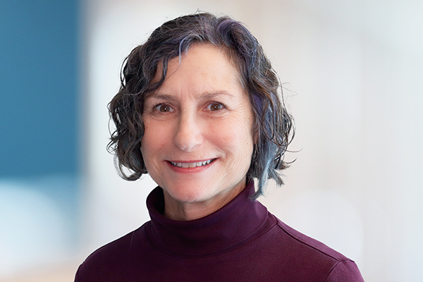 A headshot of a woman