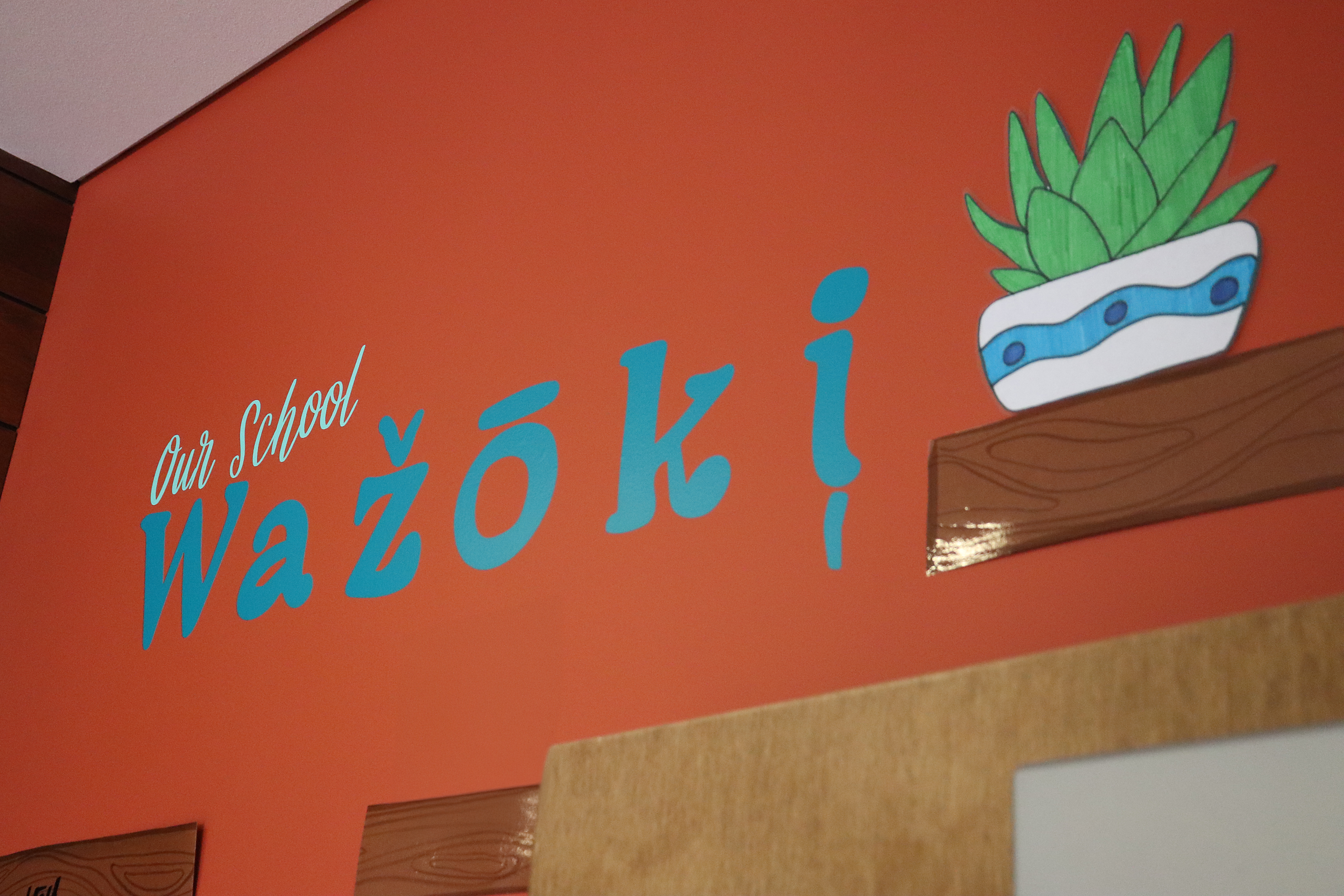 Lettering on a wall in the  Ho-Chunk language of the Winnebago Tribe