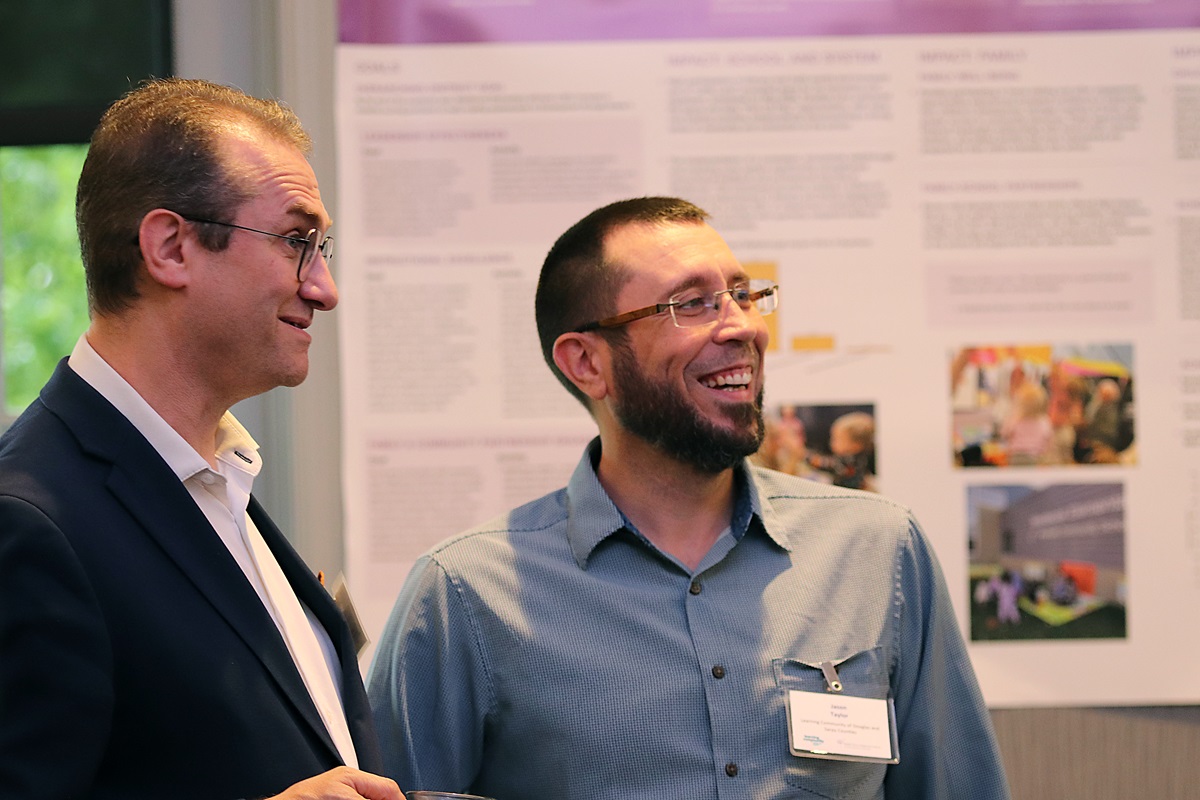 Two men standing together