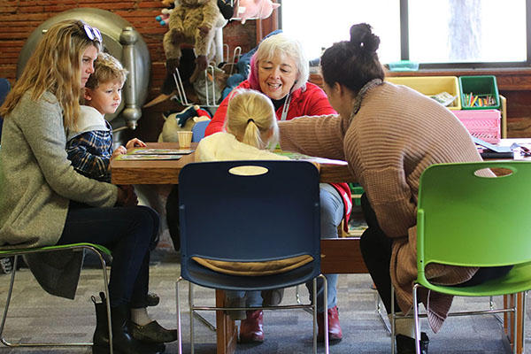 Teachers helping students at Douglas County West Elementary School