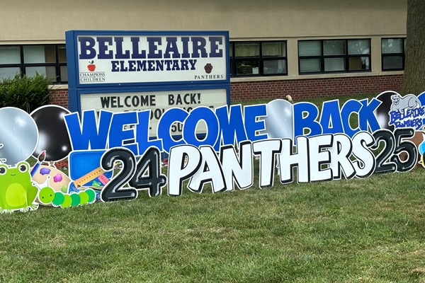 Welcome back sign in front of an elementary school