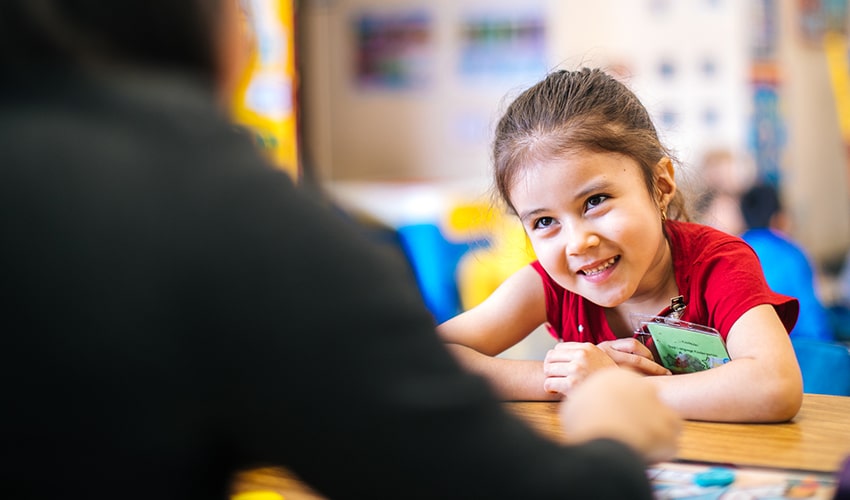 Girl sitting at desk