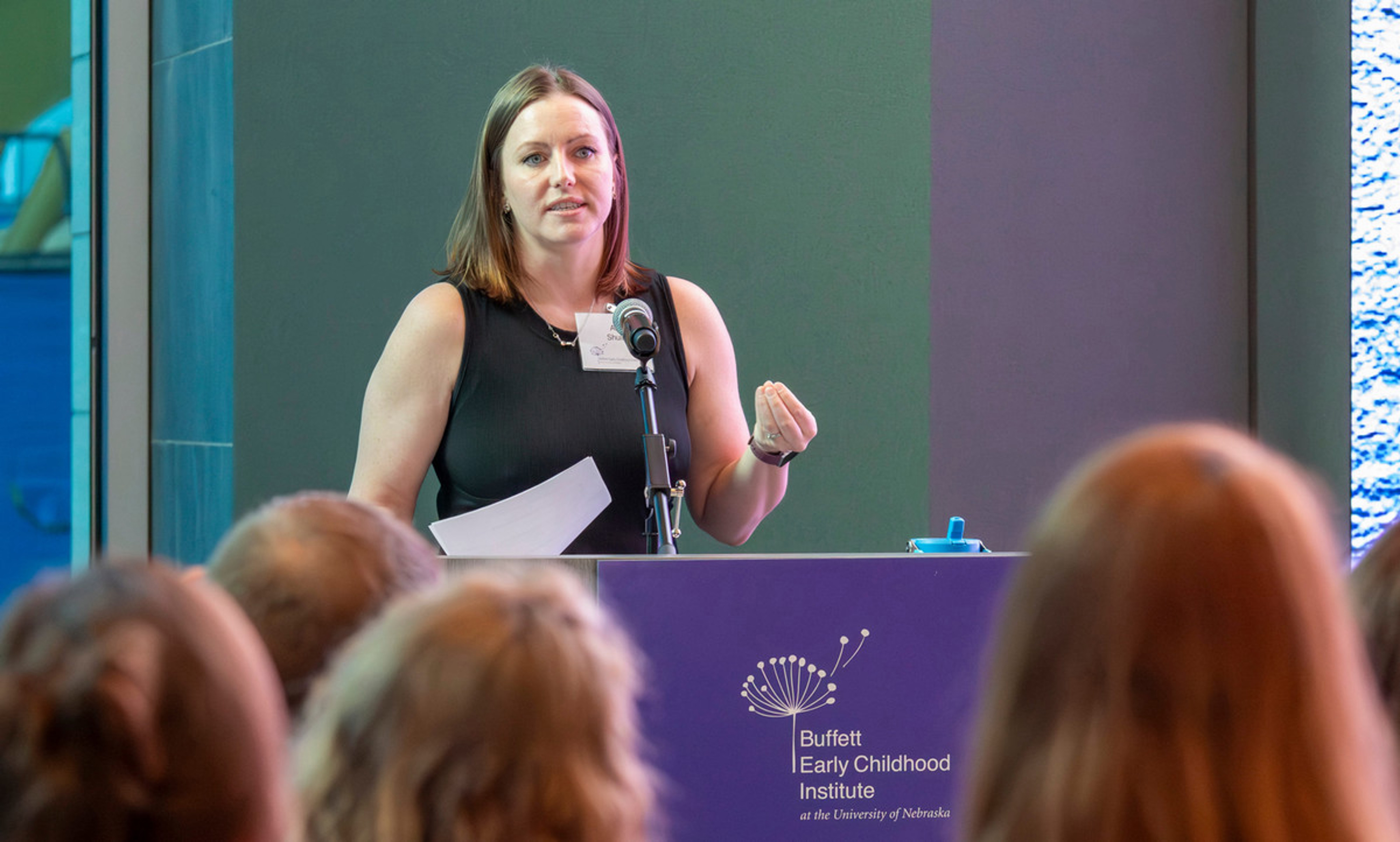University of Nebraska-Lincoln Ph.D. student Ali Shull standing and speaking at a podium