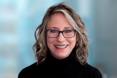 A headshot of a woman