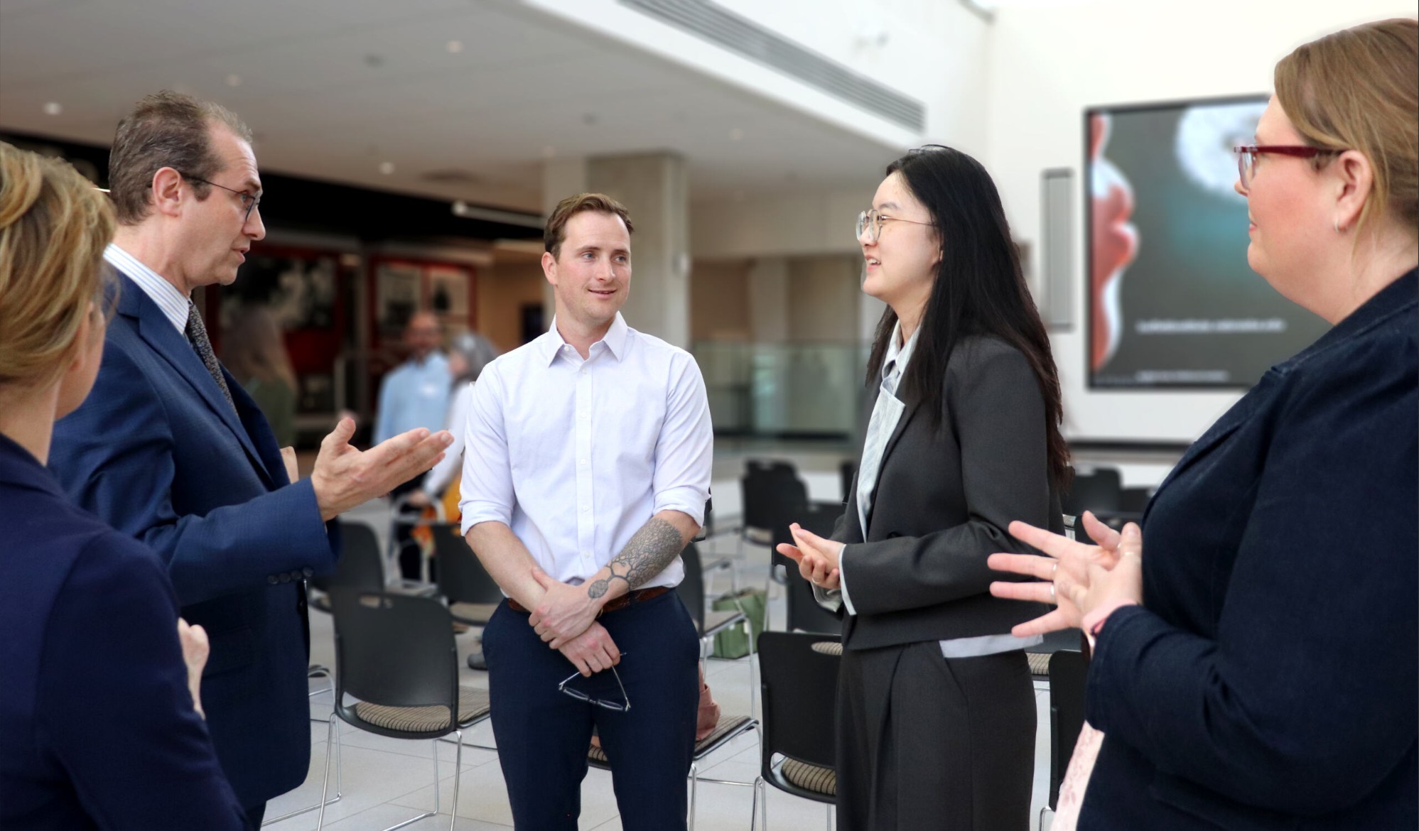 Graphic with photos of three graduate students