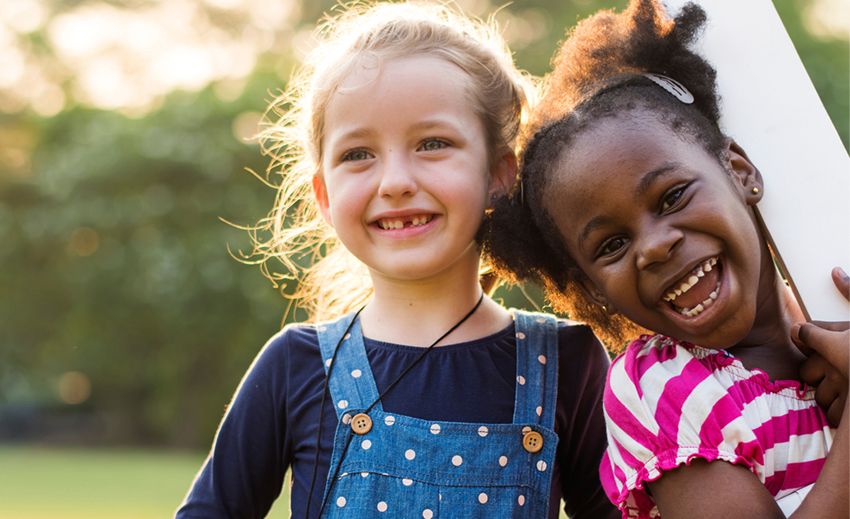 Two girls smiling